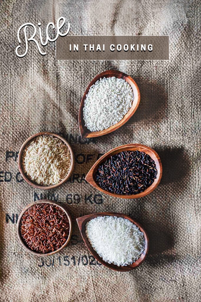 different types of Thai rice in small wooden bowl on the table.