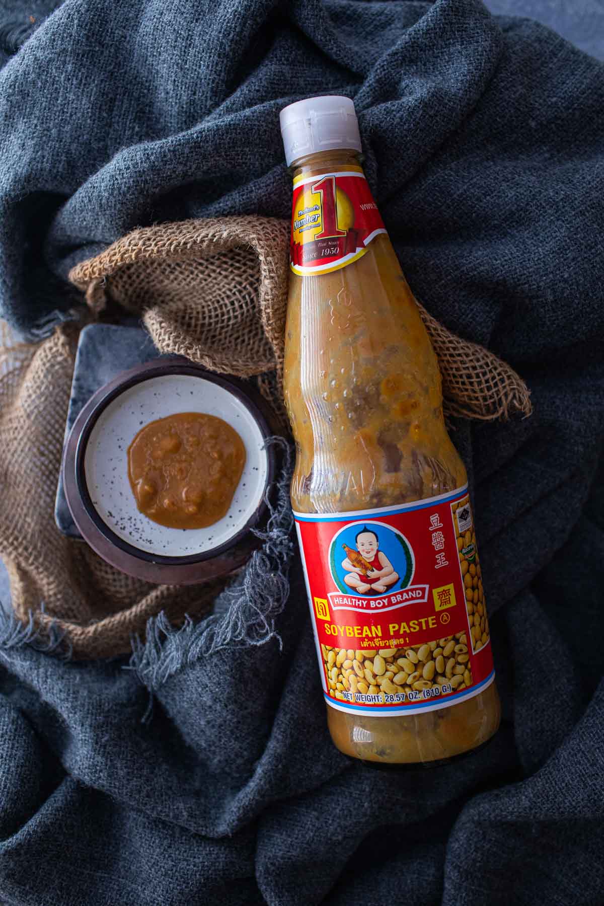 Soy bean paste bottle on a table. 