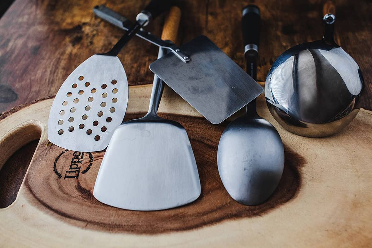 Wok spatulas on the table.