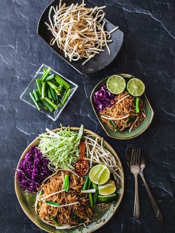 Pad mee stir fried with bean sprout lime, cabbage garnish