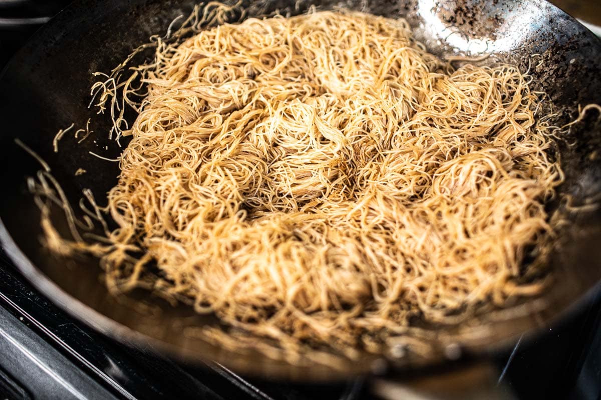 Pad Mee noodles stir fried in a wok