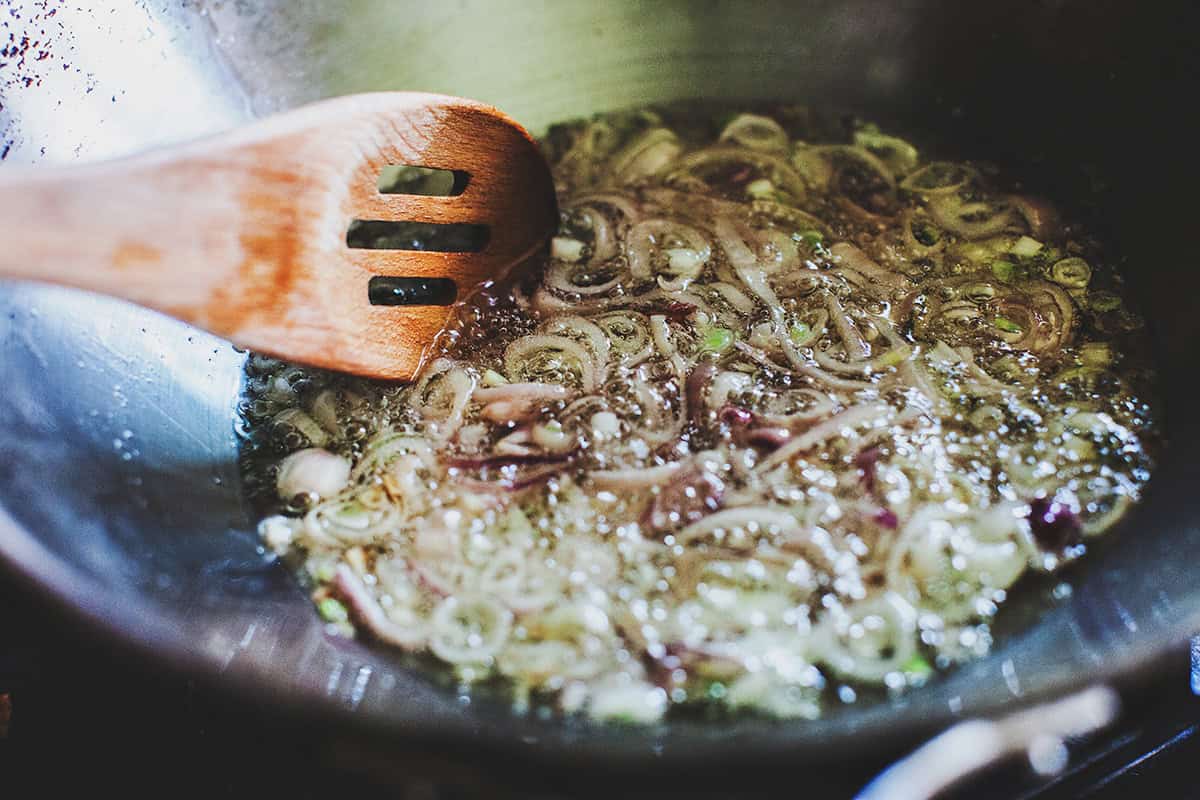 fried shallot in oil in a wok. 