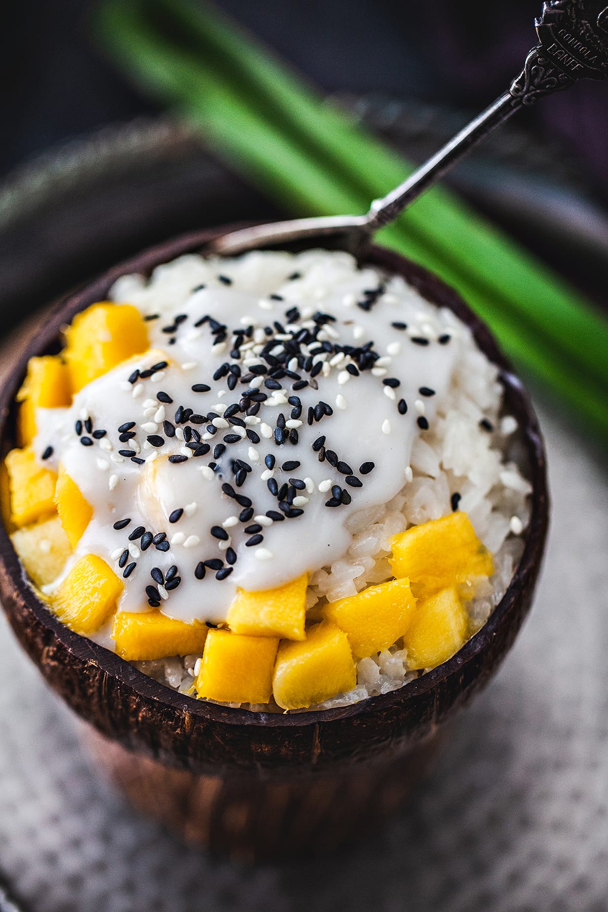 Thai mango coconut sticky rice in a small bowl. 