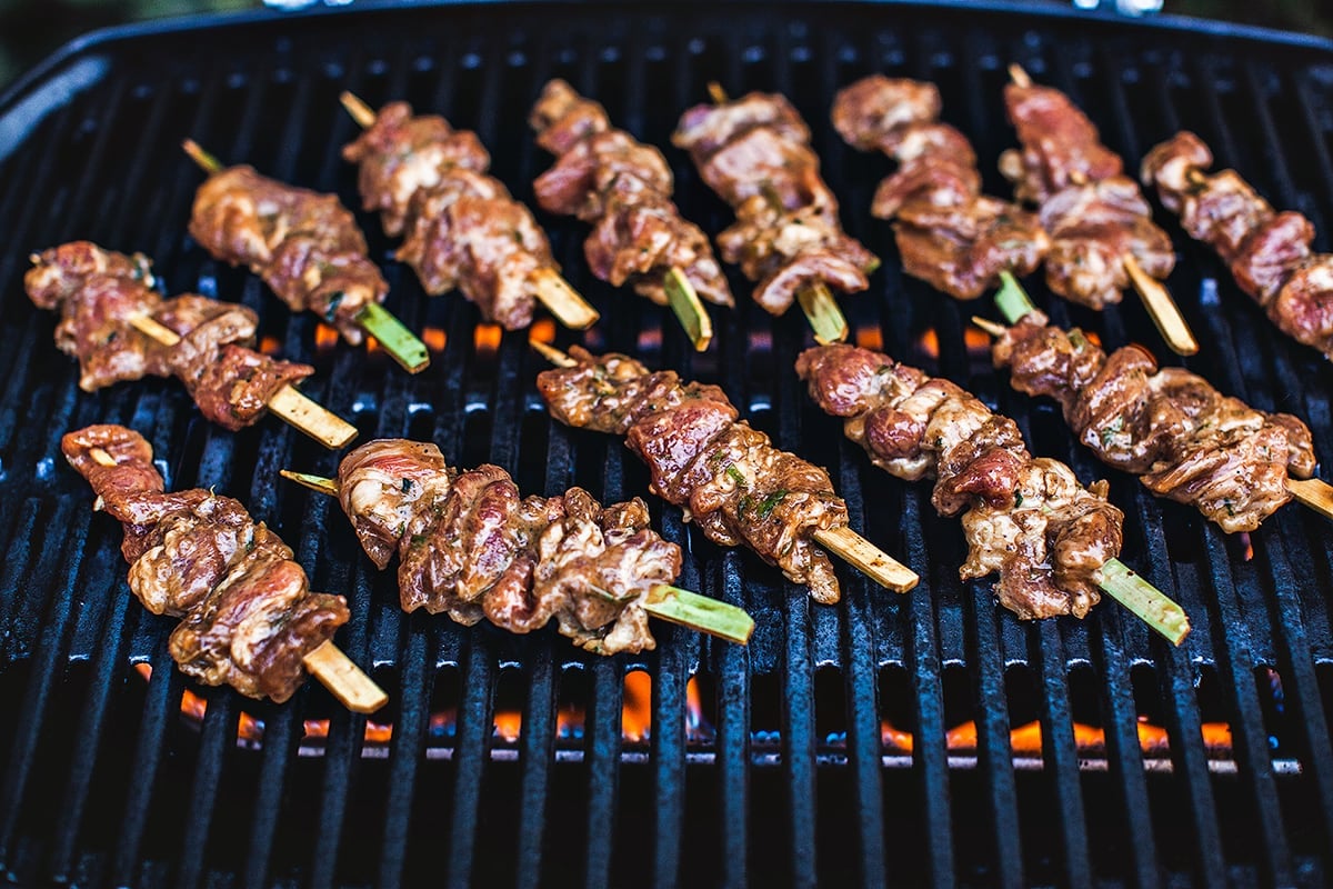 Thai pork skewers on the grill.