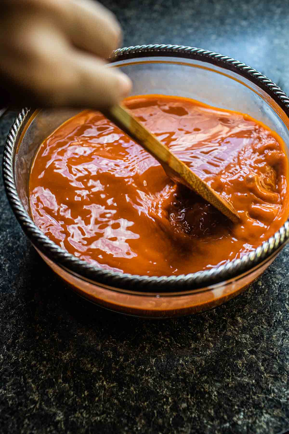 Thai iced tea in a glass bowl.