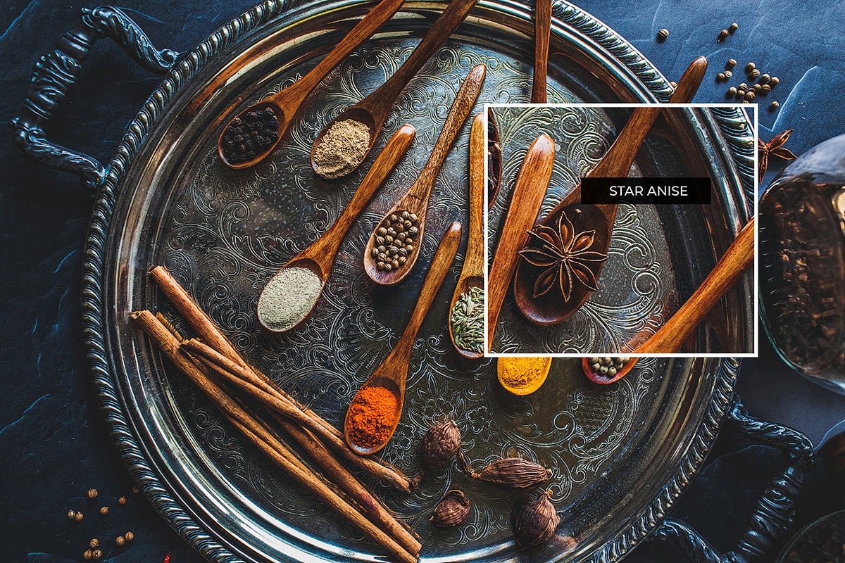 Star anise on a stray with other spices.