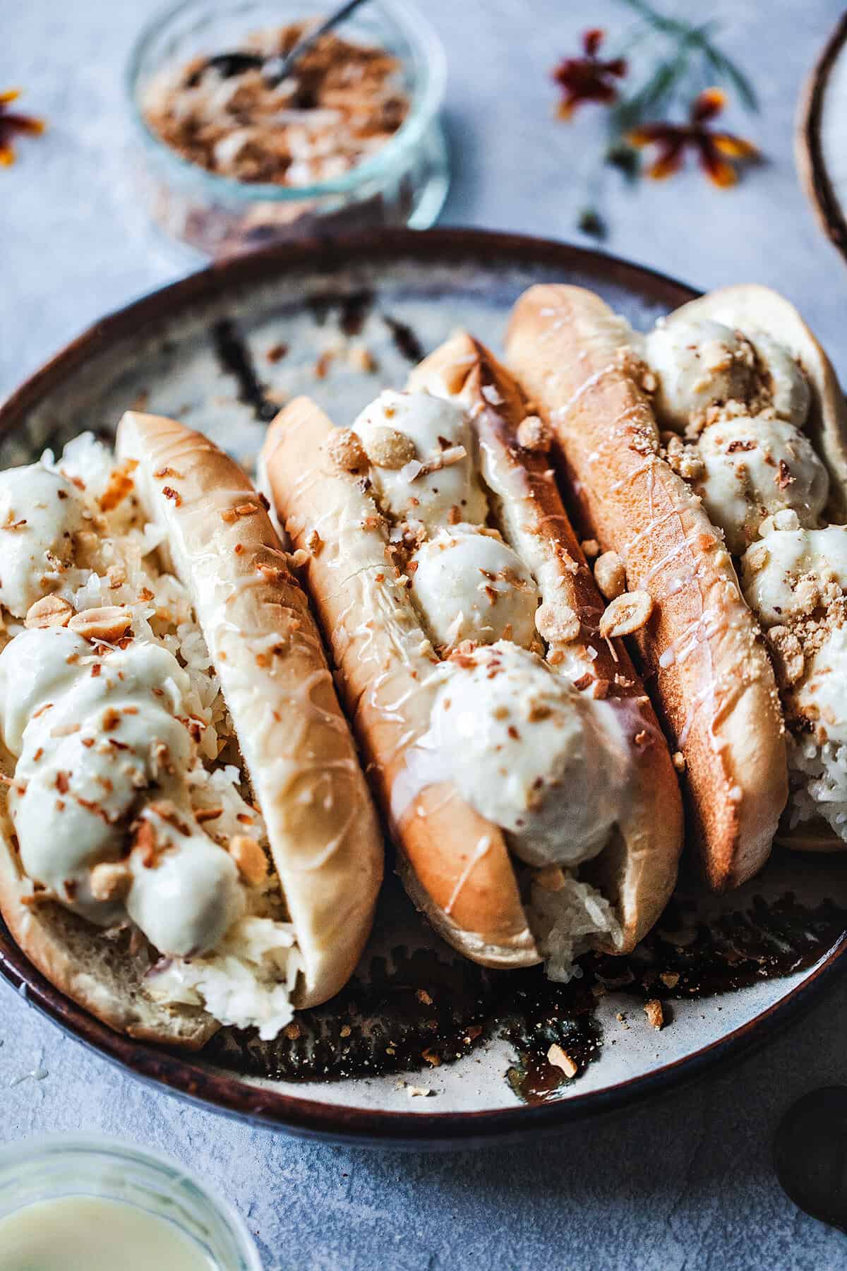 Thai coconut ice cream with bread on a platter. 