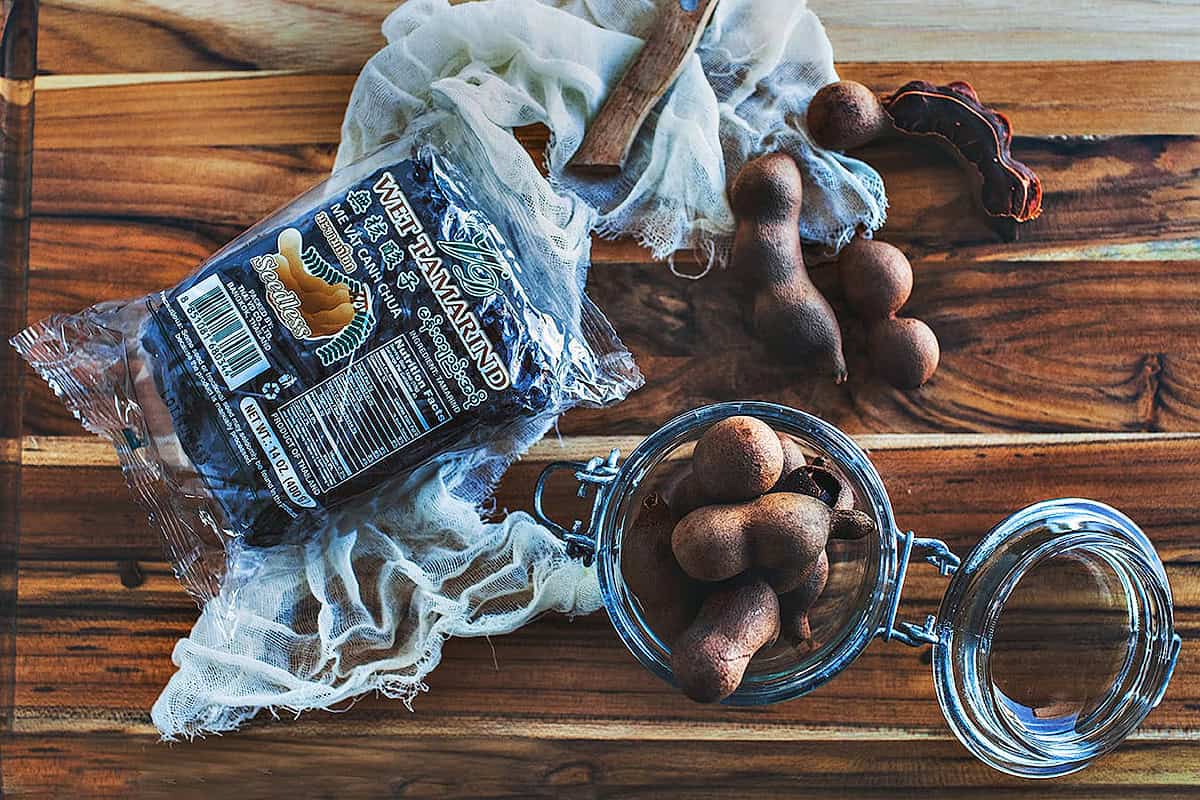 Tamarind pods on the table. 