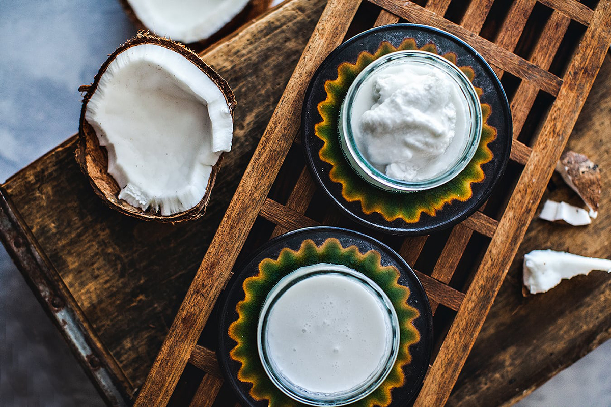 Thai Coconut milk and cream on the table.