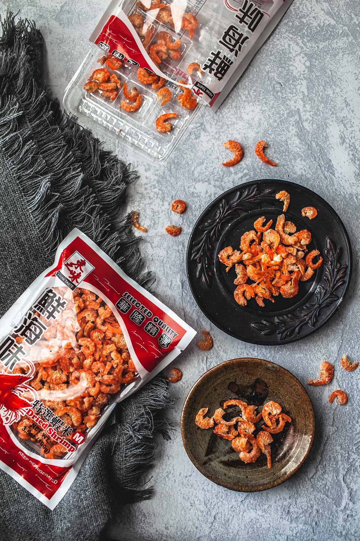 Dried shrimp in packages and on the table.