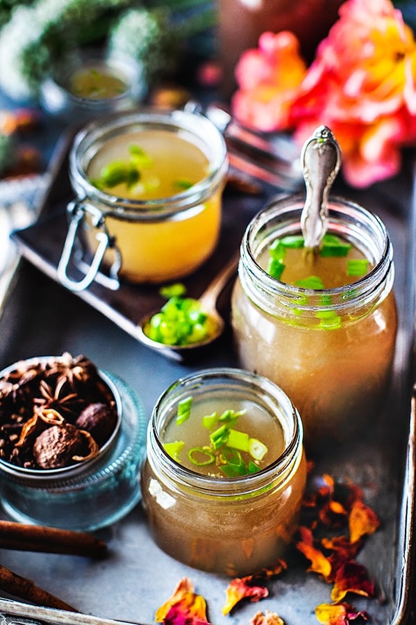 How to make beef bone broth recipe using a slow cooker. A delicious homemade recipe infused with fragrant Asian spices that is good for many uses in the kitchen. You can drink this beef bone broth to help cleanse and heal your body from inflammation.