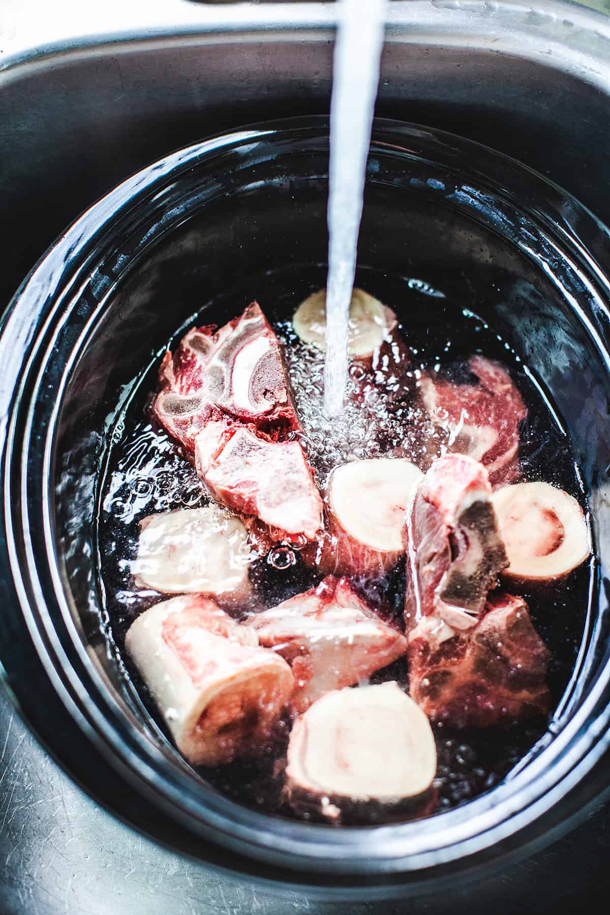 Beef bones in a crock pot with water. 