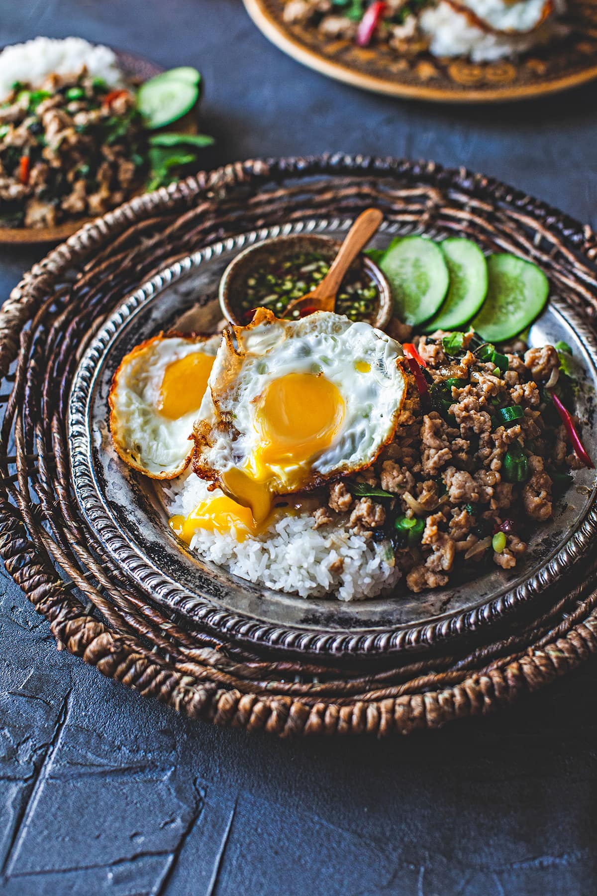 Thai basil pad krapow with runny eggs on top