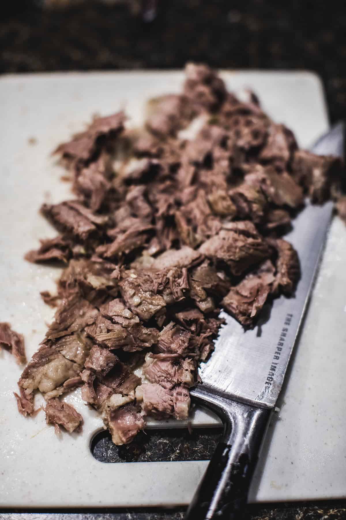 Shredded Pork ribs for on a cutting board.