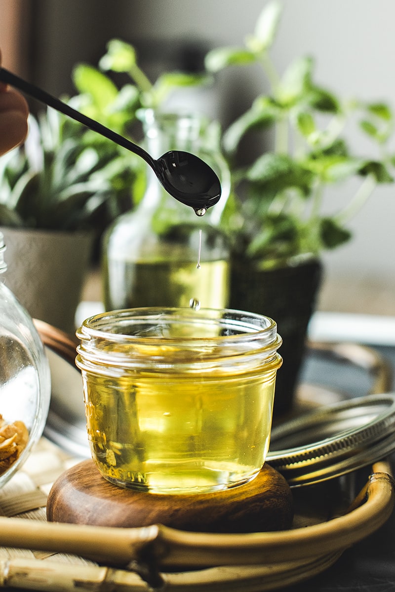 Garlic oil in a glass container