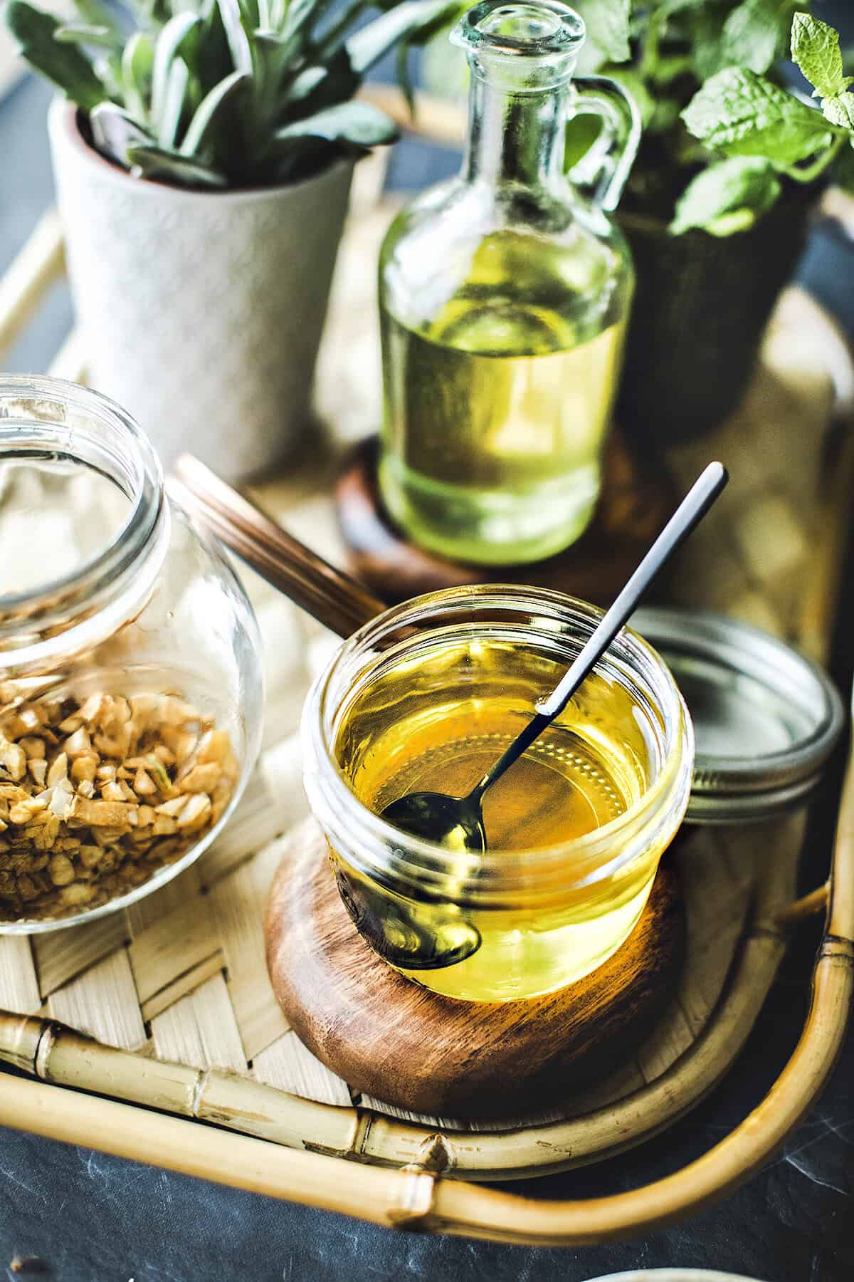 Garlic oil in a glass jar.