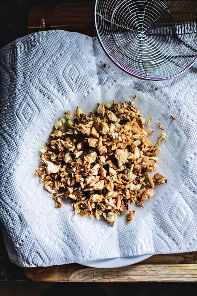 Fried garlic on a paper towels.