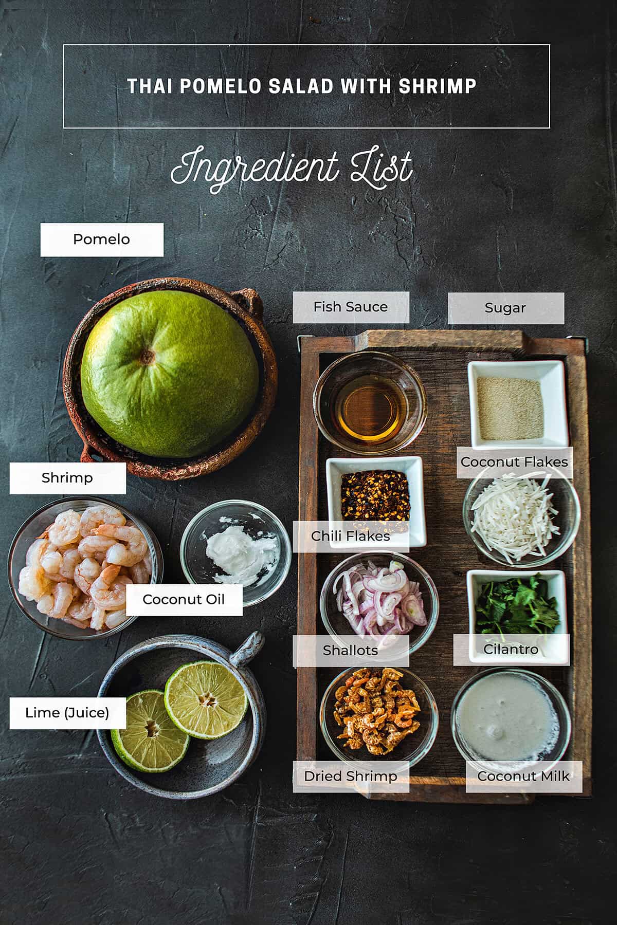 Thai pomelo salad ingredients on a table. 