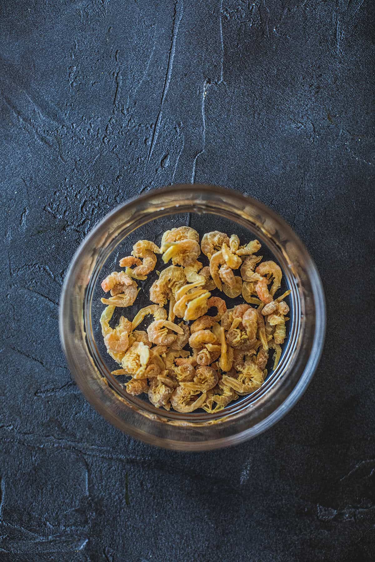 Soaked dried shrimp in a bowl. 