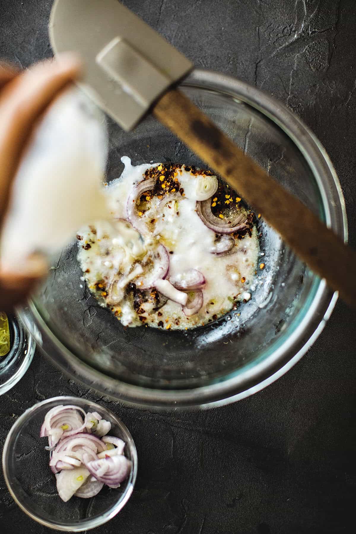 Coconut milk in a Pomelo salad sauce in a bowl. 