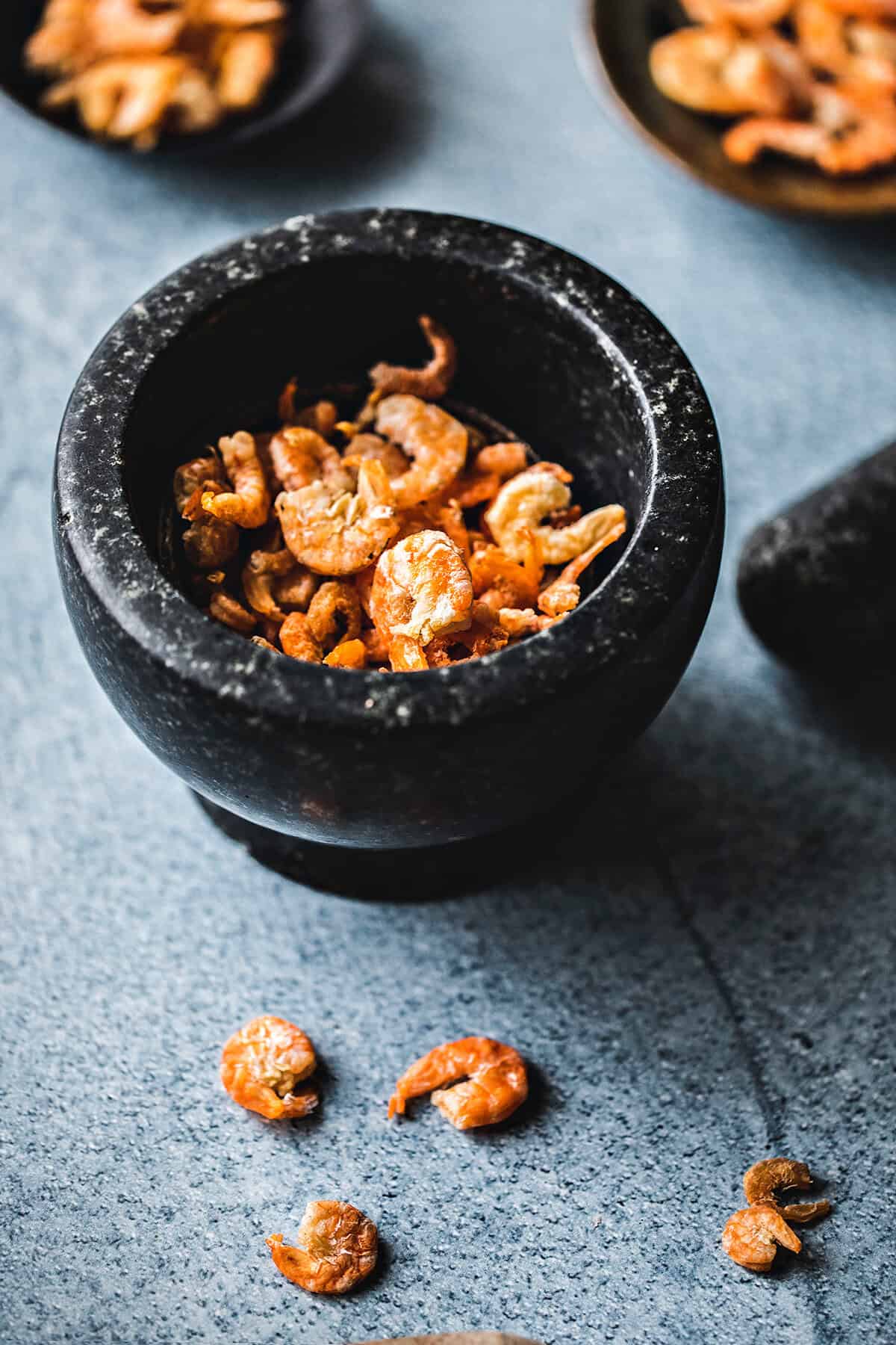 Dried shrimp in a mortar.