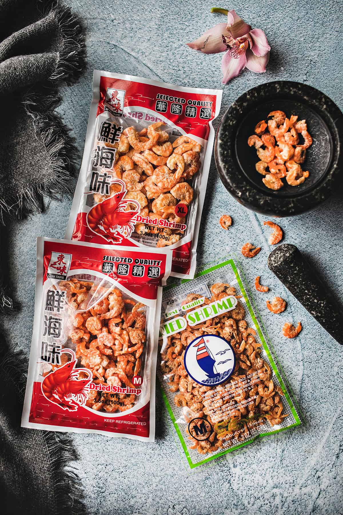 Dried shrimp in packages on the table. 