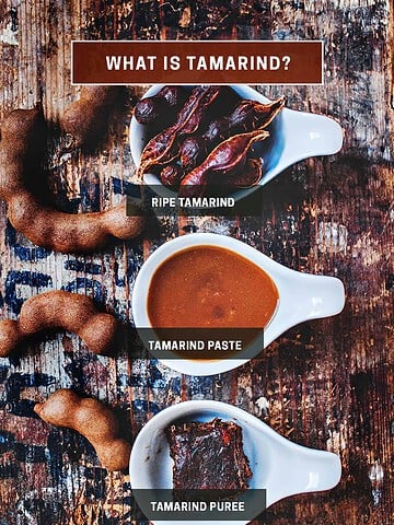 Tamarind paste, pulp and pods on a table.