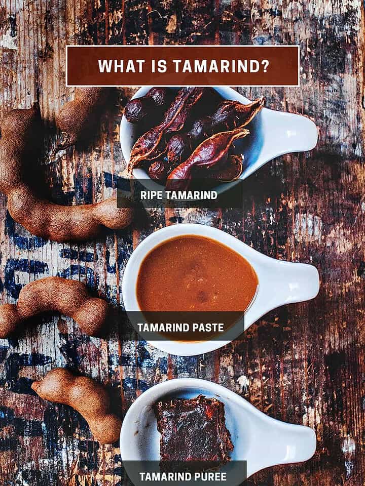 Tamarind paste, pulp and pods on a table.