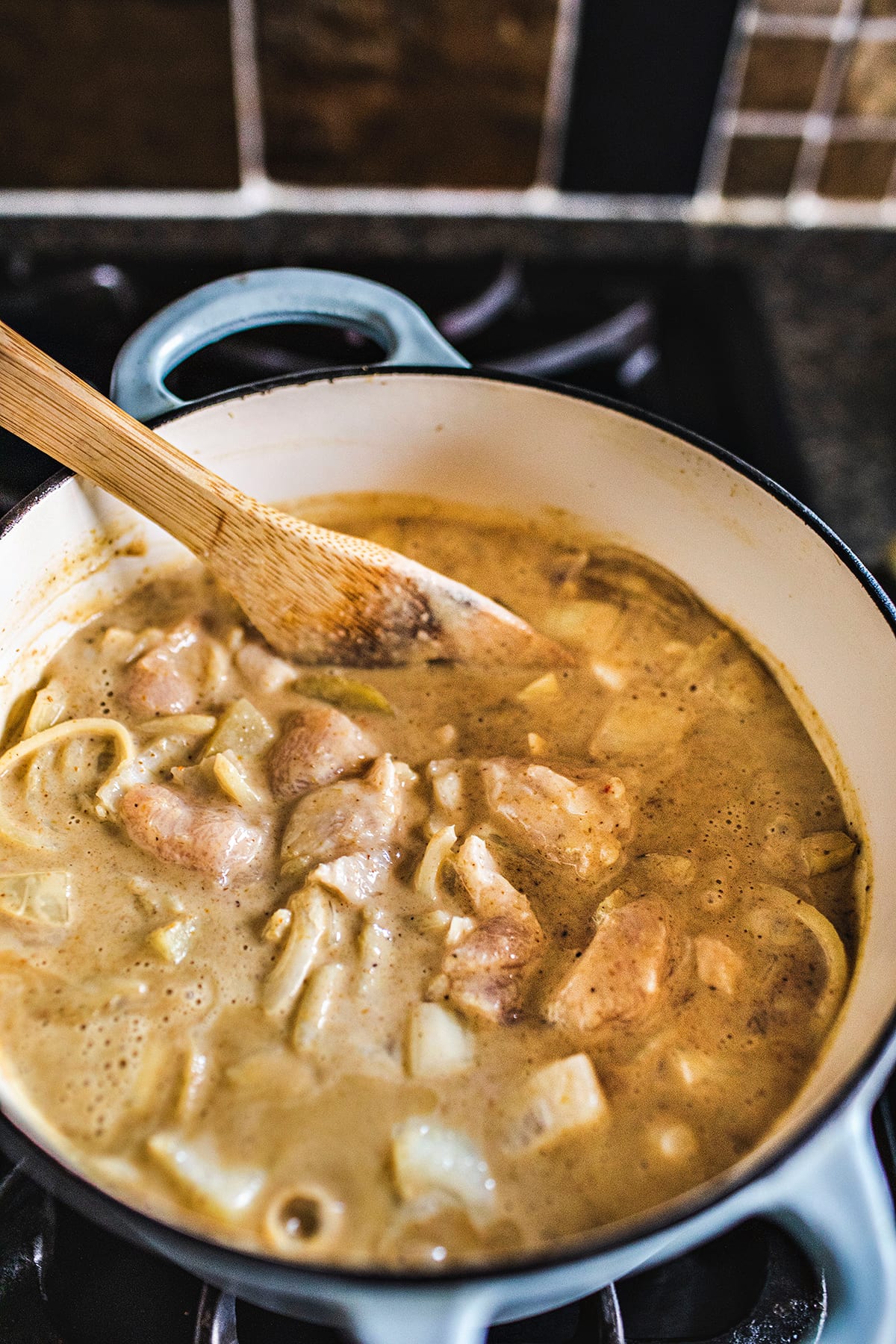 thai yellow curry with chicken in a pot