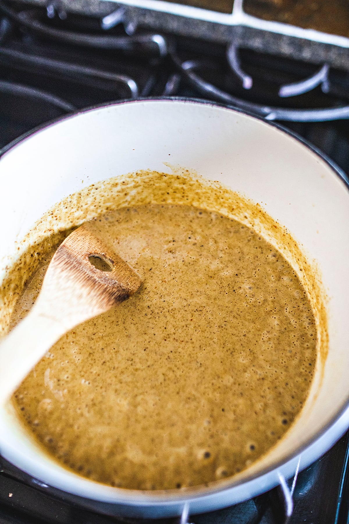 yellow curry sauce in a pot on the stove