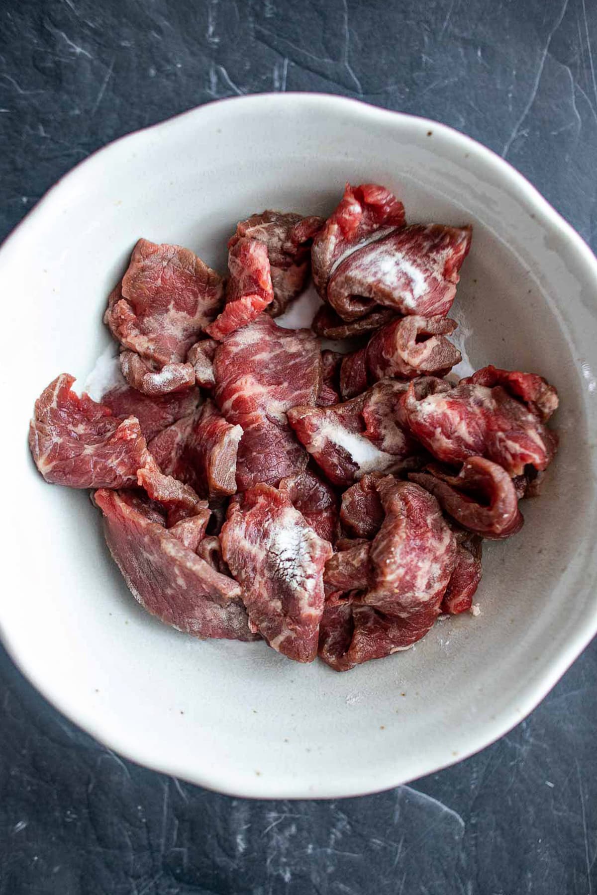 Beef slices with baking soda for rad na recipe.