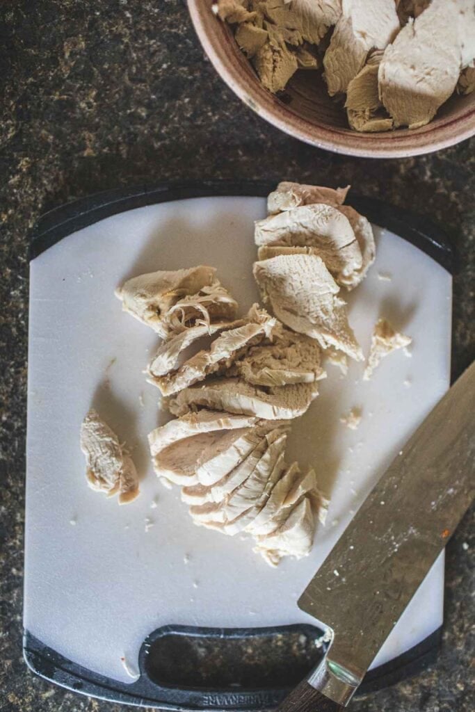 sliced boiled chicken for yum woon sen salad.