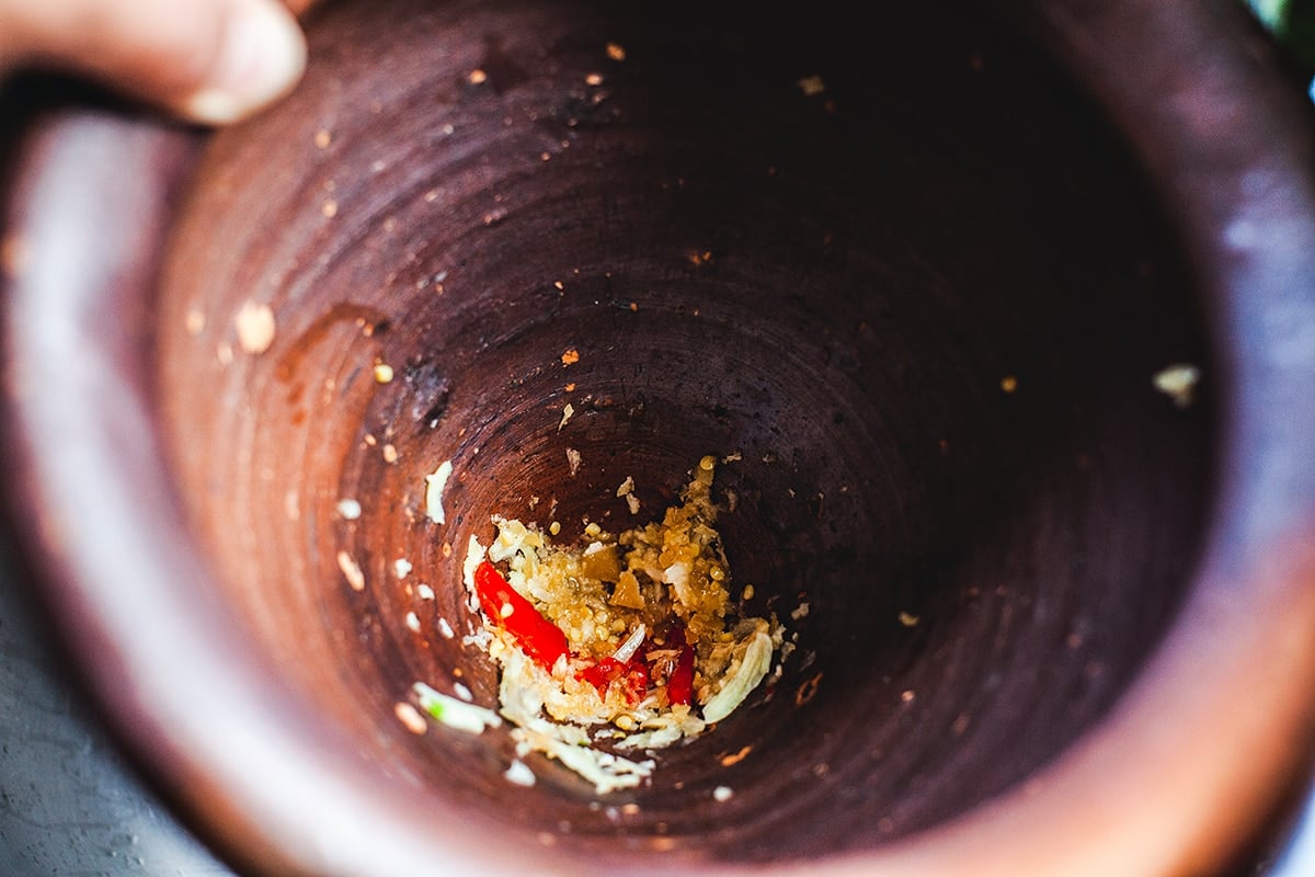 Pounded Chili and garlic in a mortar. 