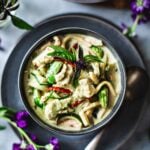 Thai green curry in a bowl on the table.