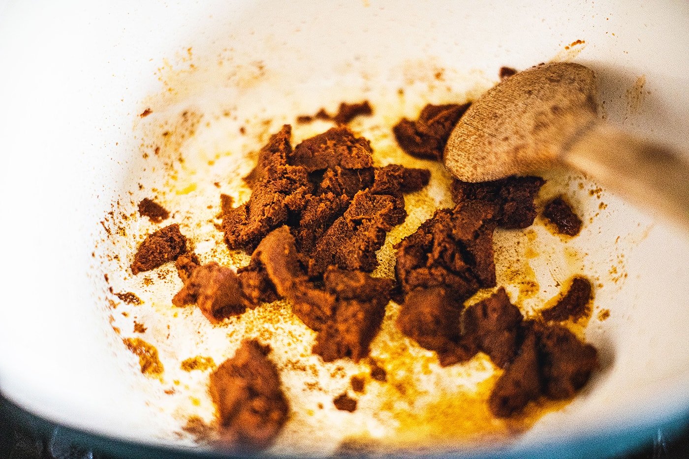 Massaman curry paste in a stock pot. 