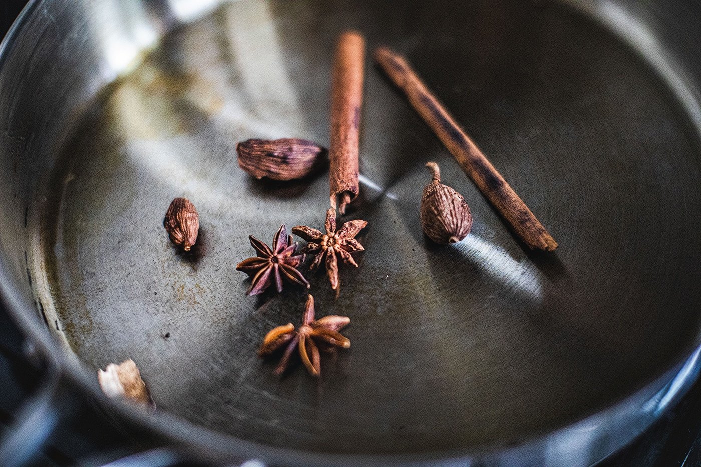 Toasted spices in a skillet.