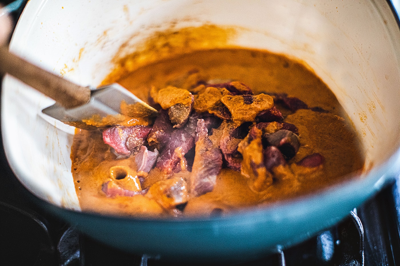 Massaman curry in a soup pot with beef.