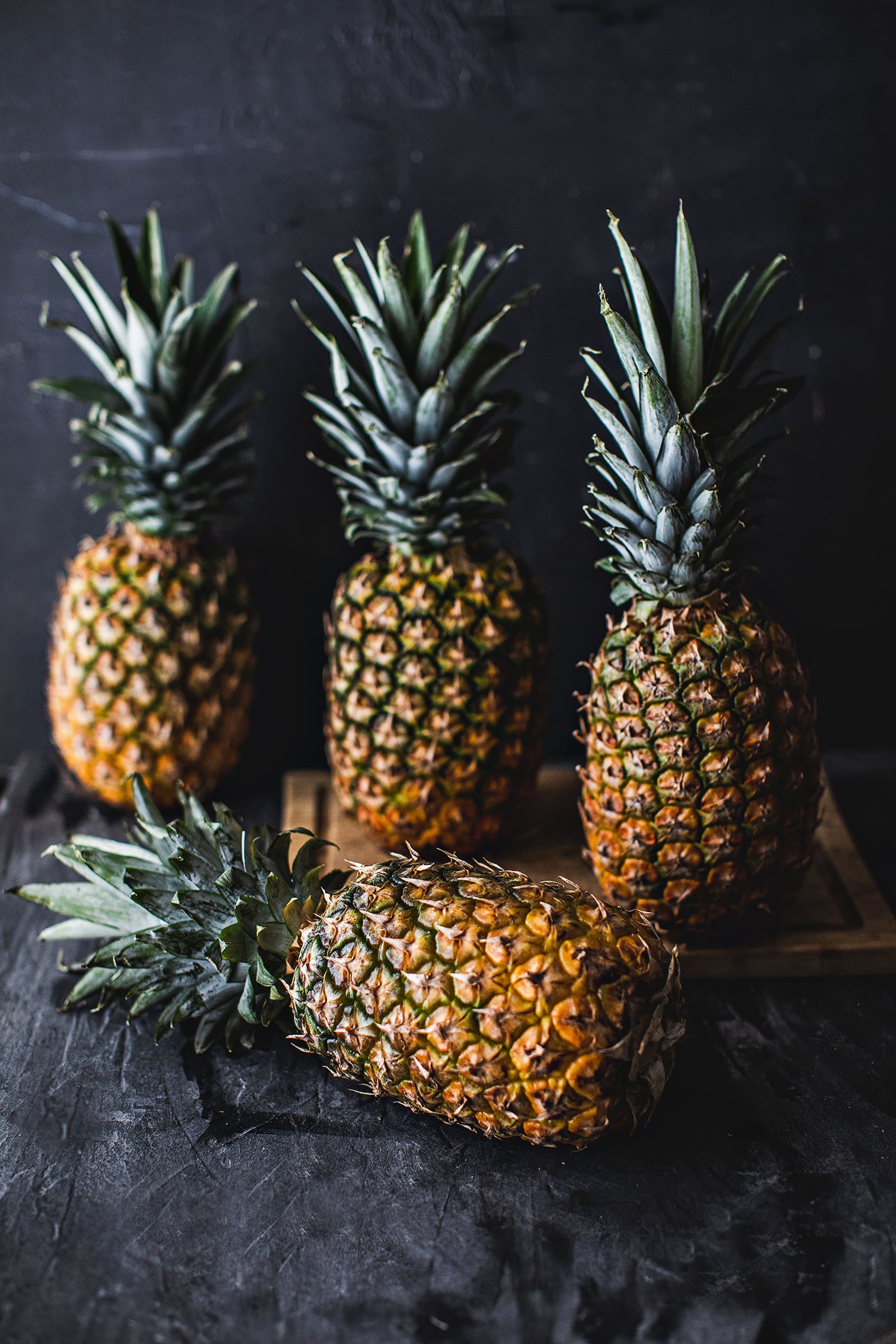 Do you love pineapples but have always been intimidated by how to cut them? Today, I'm going to show you, step by step with helpful photo instructions, how to cut a pineapple, AND  how to to make a pineapple bowl! Get ready to be an expert at cutting your favorite fruit.  #pineapples #howtocutpineapple #cuttingpineapple #pineapplecutting 