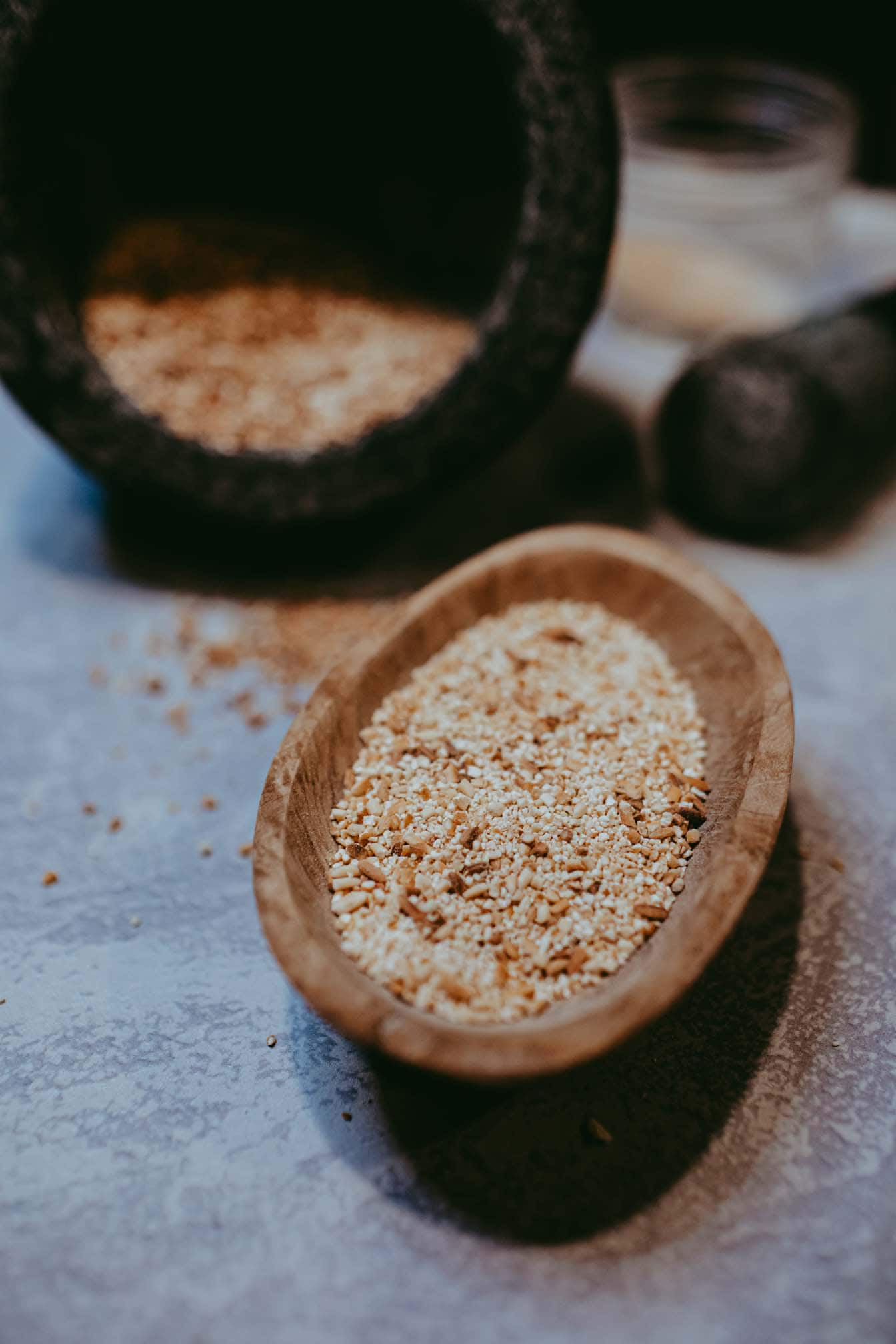 Ground toasted rice powder in an oval wooden bowl.