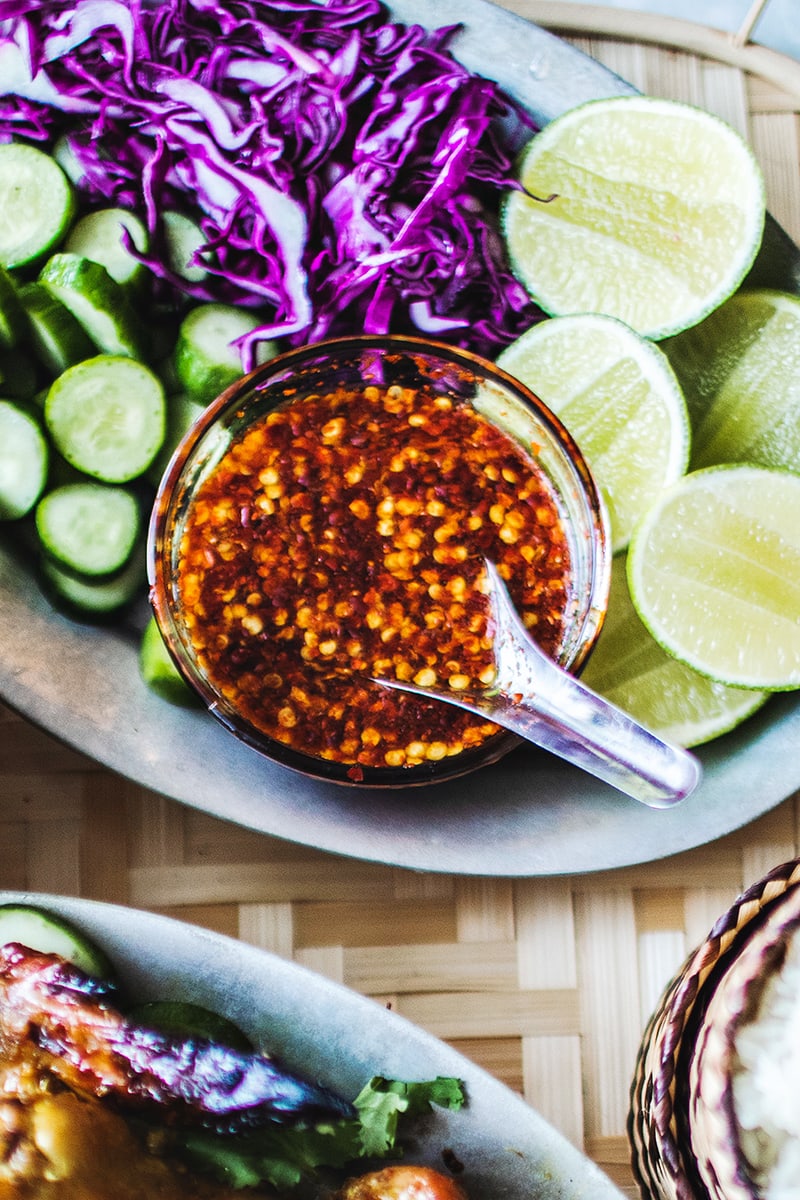 Spicy chili dipping sauce in a small glass bowl