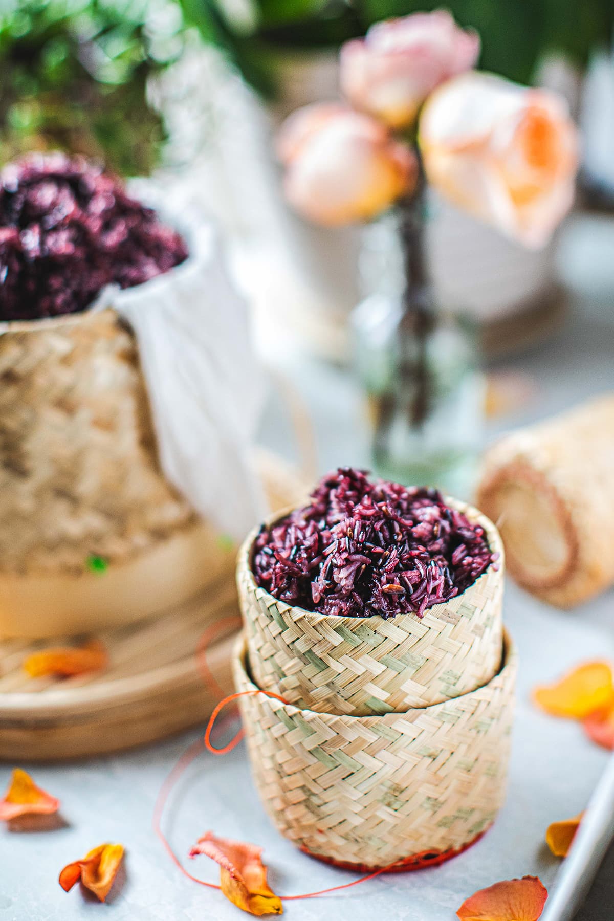 purple sticky rice in a small bamboo basket 