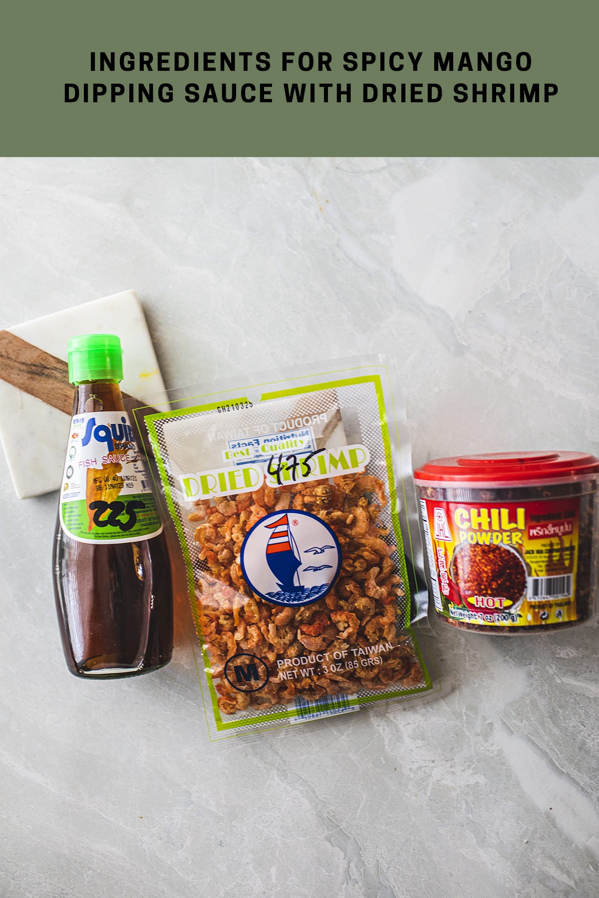 fish sauce, dried shrimp, chili flakes on a counter