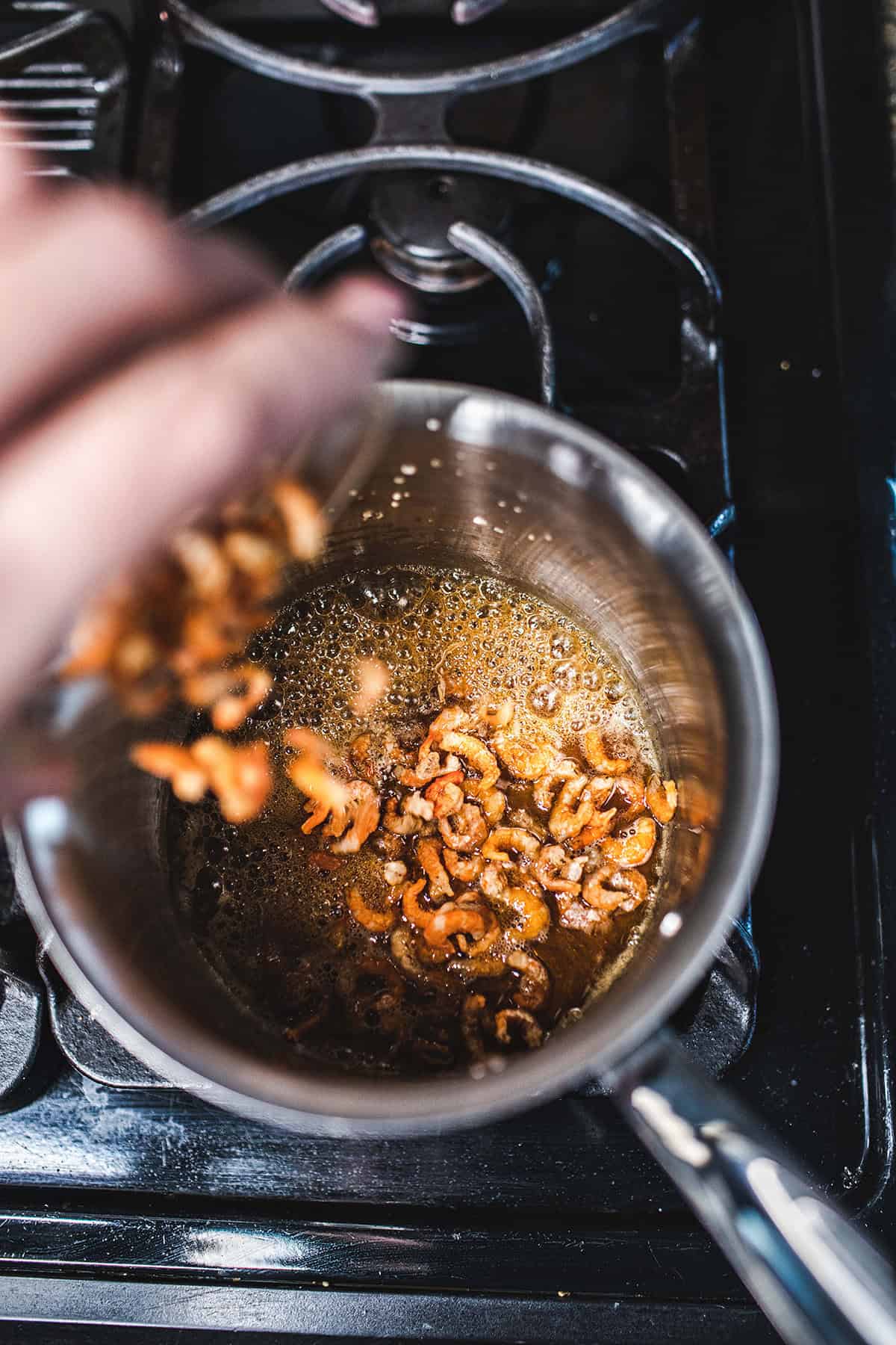 spicy chili sauce in a pot with dried shrimp. 