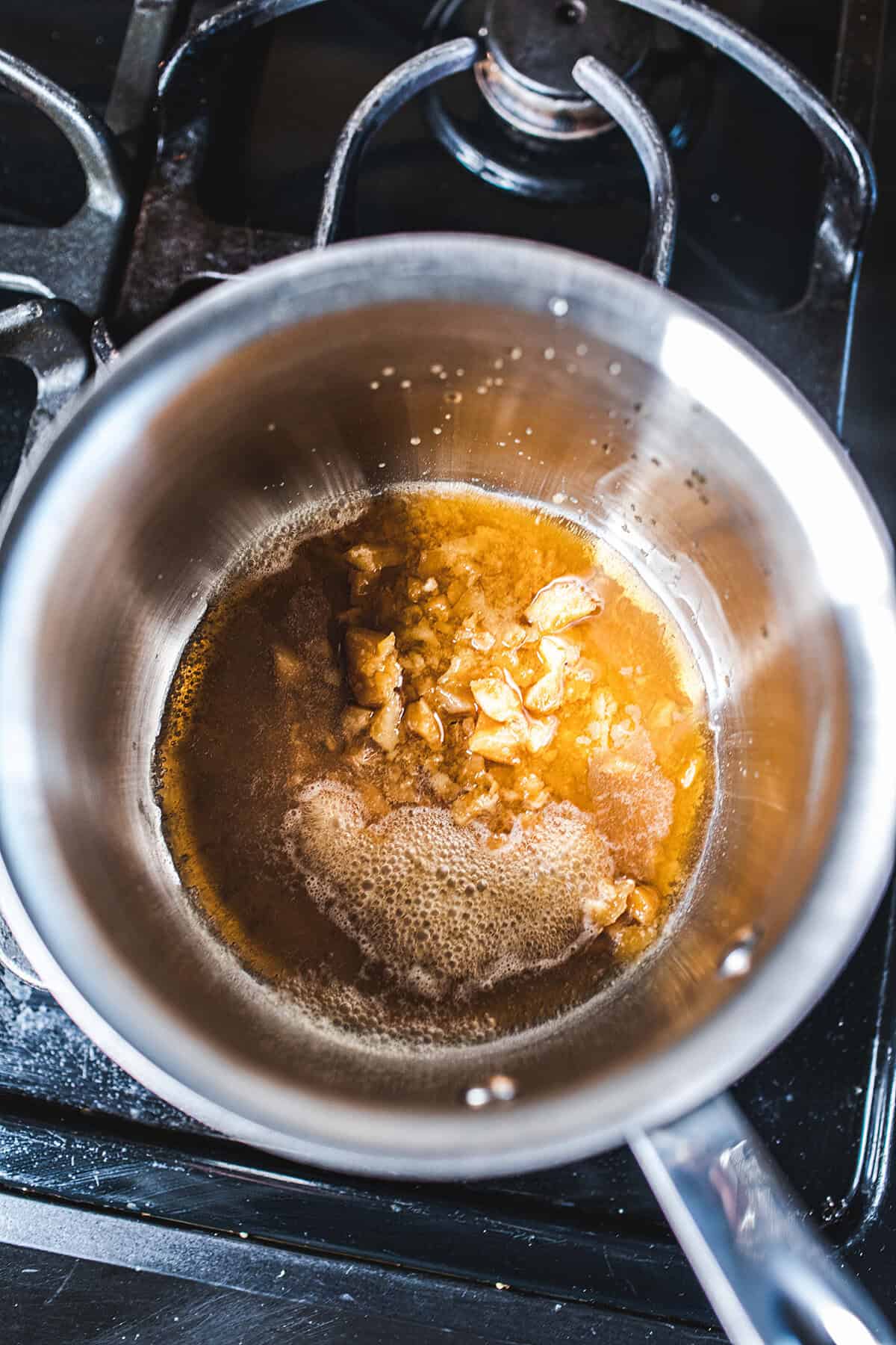 Palm sugar in a pot over the stop. 