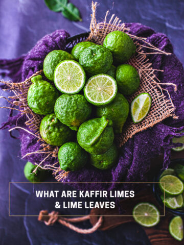 Kaffir limes in a basket with purple towel