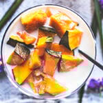 kabocha squash in coconut milk in a glass cup