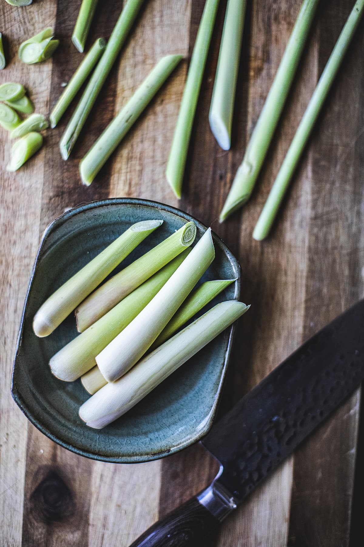 lemongrass stalks in a green bowl