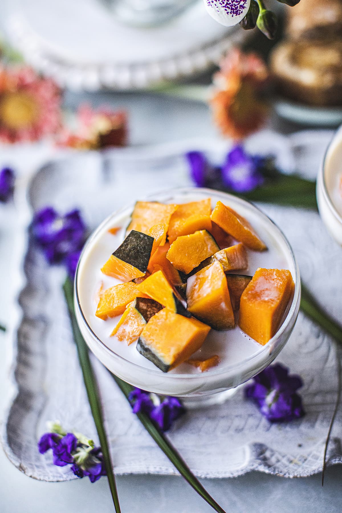 Kabocha squash dessert in coconut milk in a glass bowl