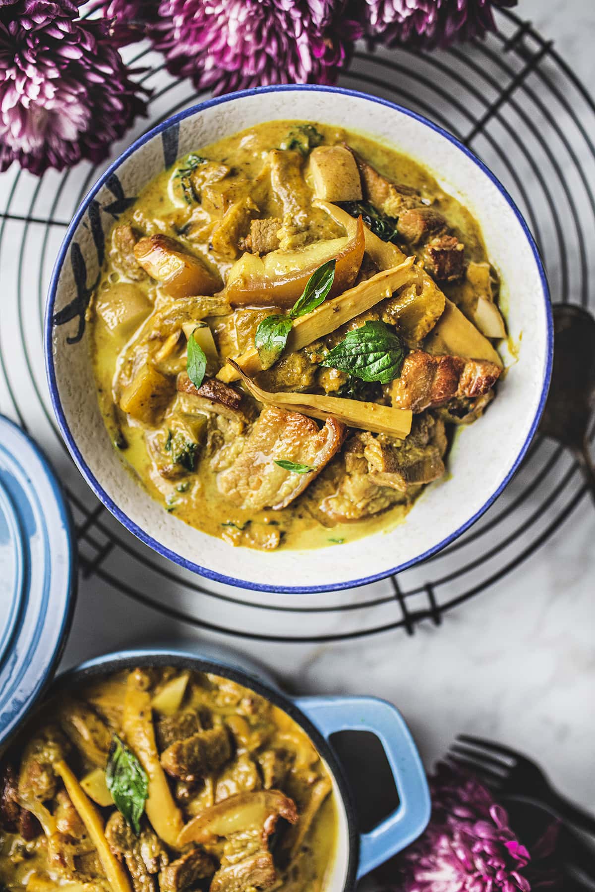 pork belly yellow curry in a bowl on table