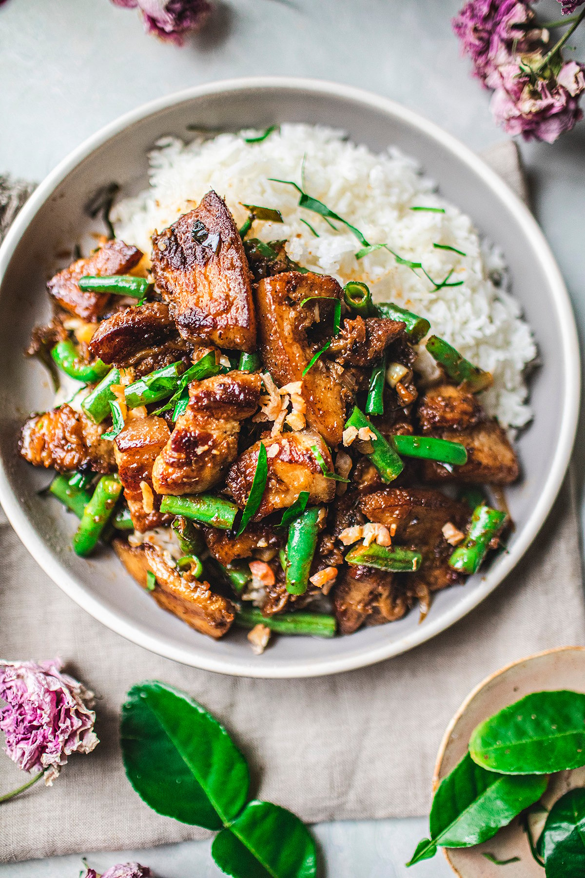 Stir fry pork belly over rice